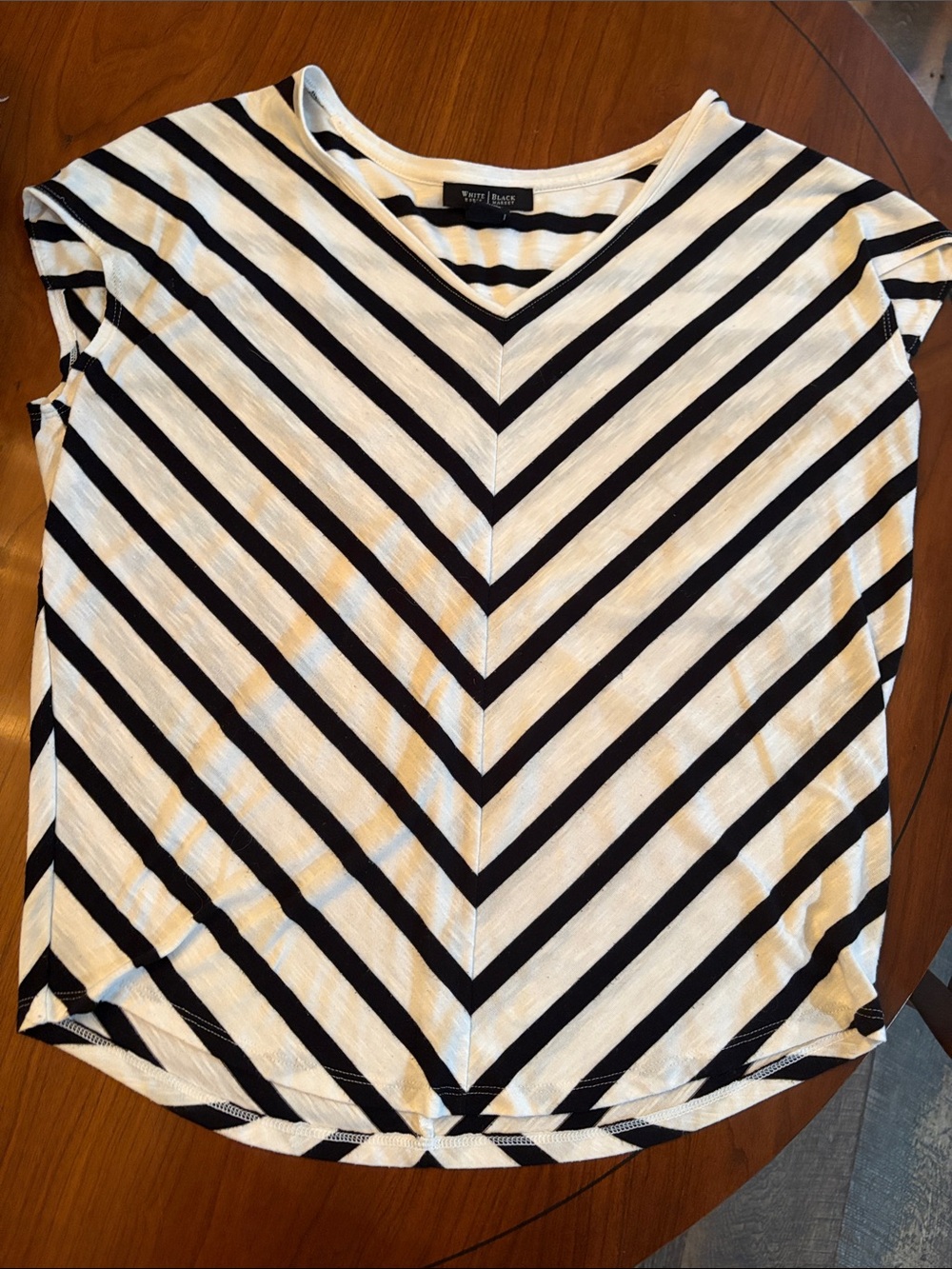 White House Black Market Black and White V‑Neck Chevron Tee